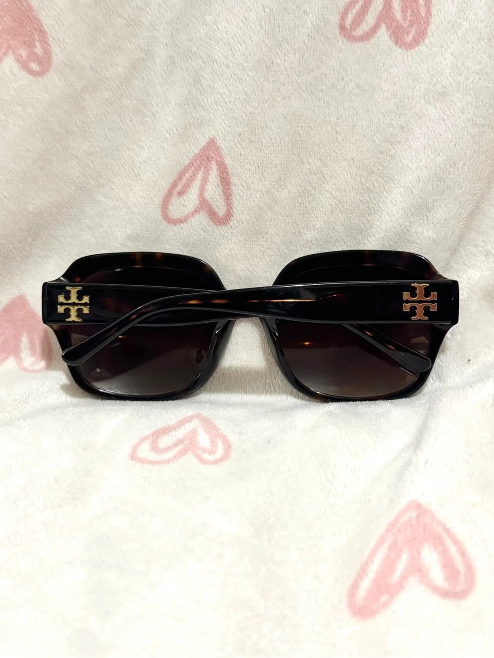 Tory Burch sunglasses with a tortoiseshell pattern